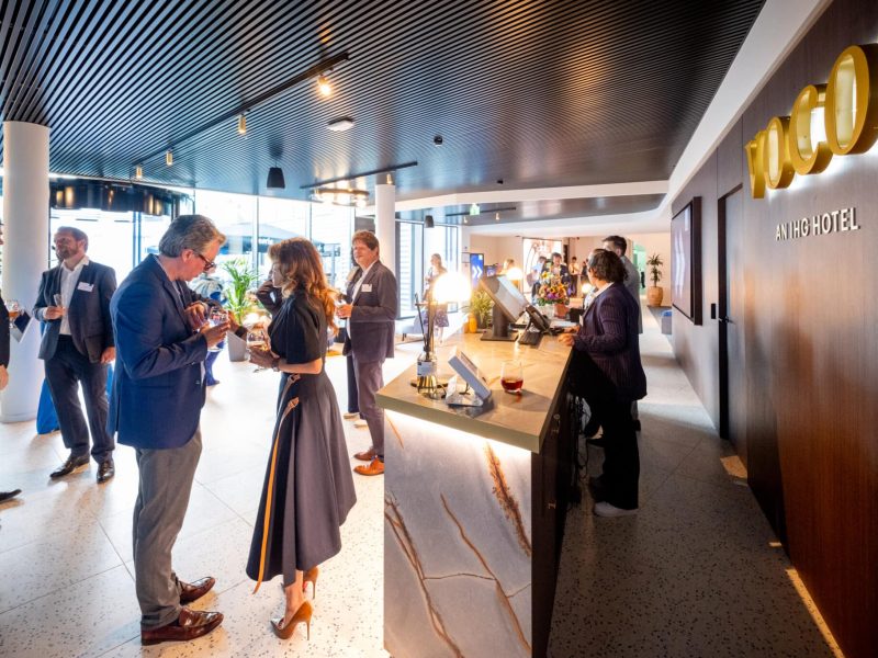 people networking at a business event in the voco Brussels hotel lobby