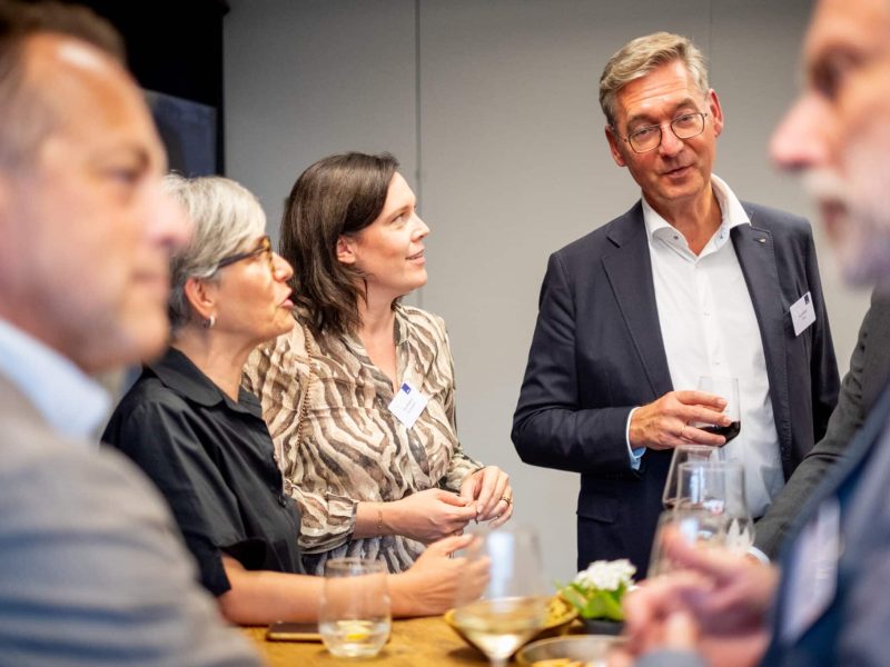 people networking at a business event