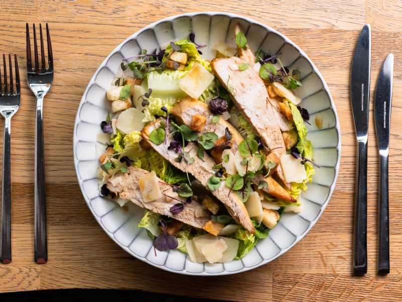 Round Plate with Caesar Salad and cutlery