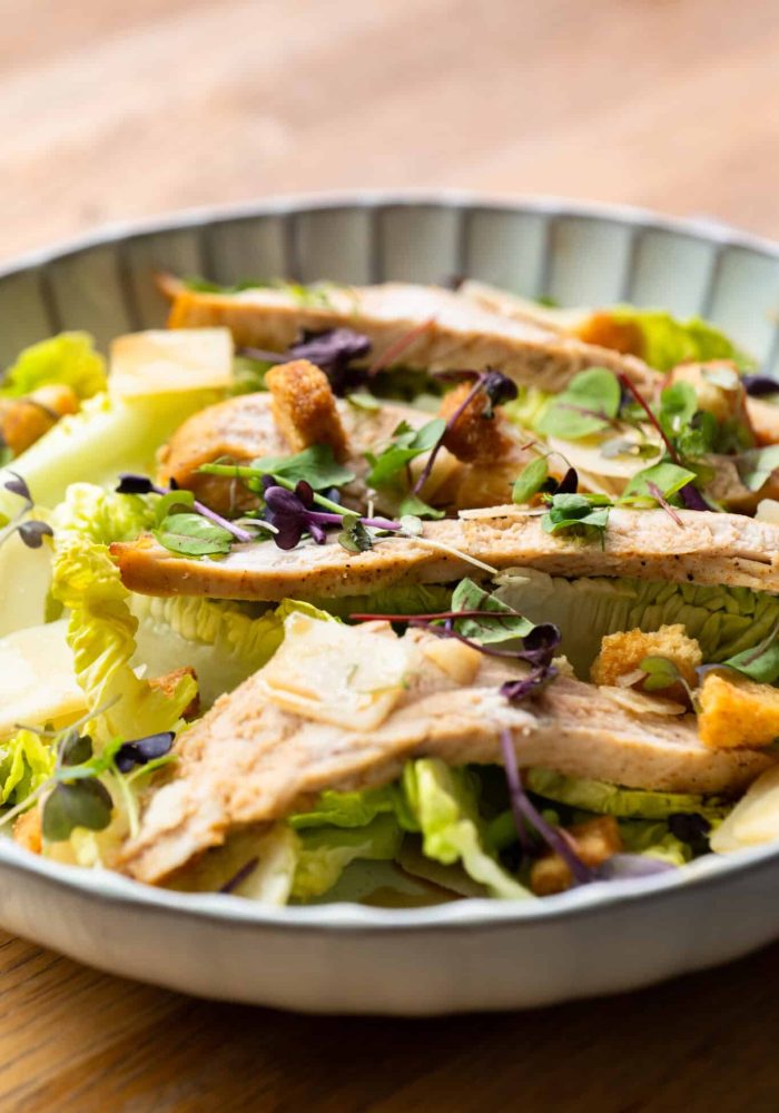 Round Plate with Caesar Salad and chicken