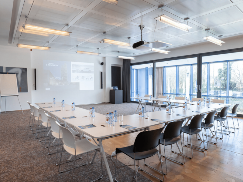Meeting room at voco with bottles on table