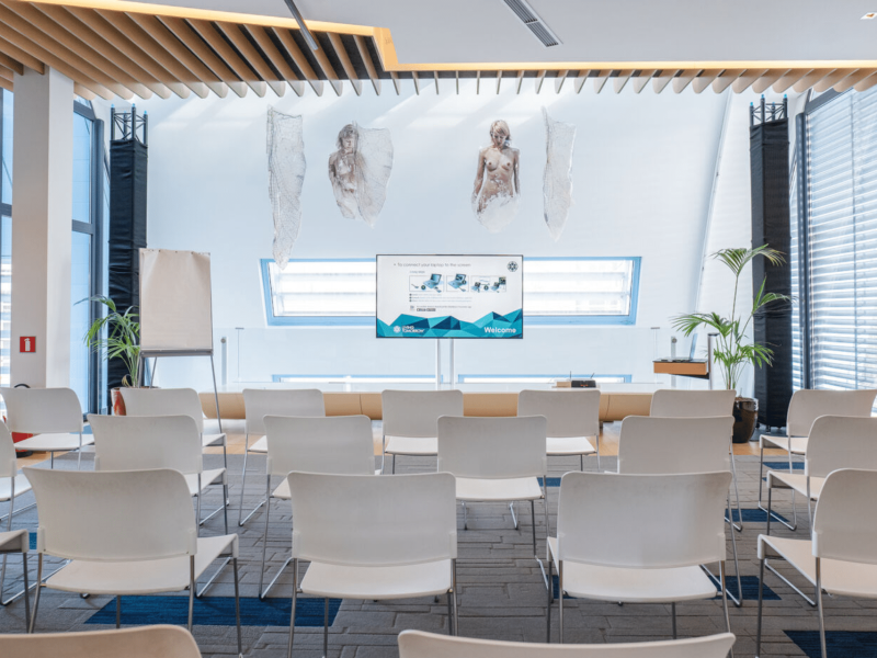 Meeting room at voco with white chairs